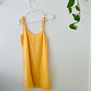 UO yellow silk shoulder tie slip dress